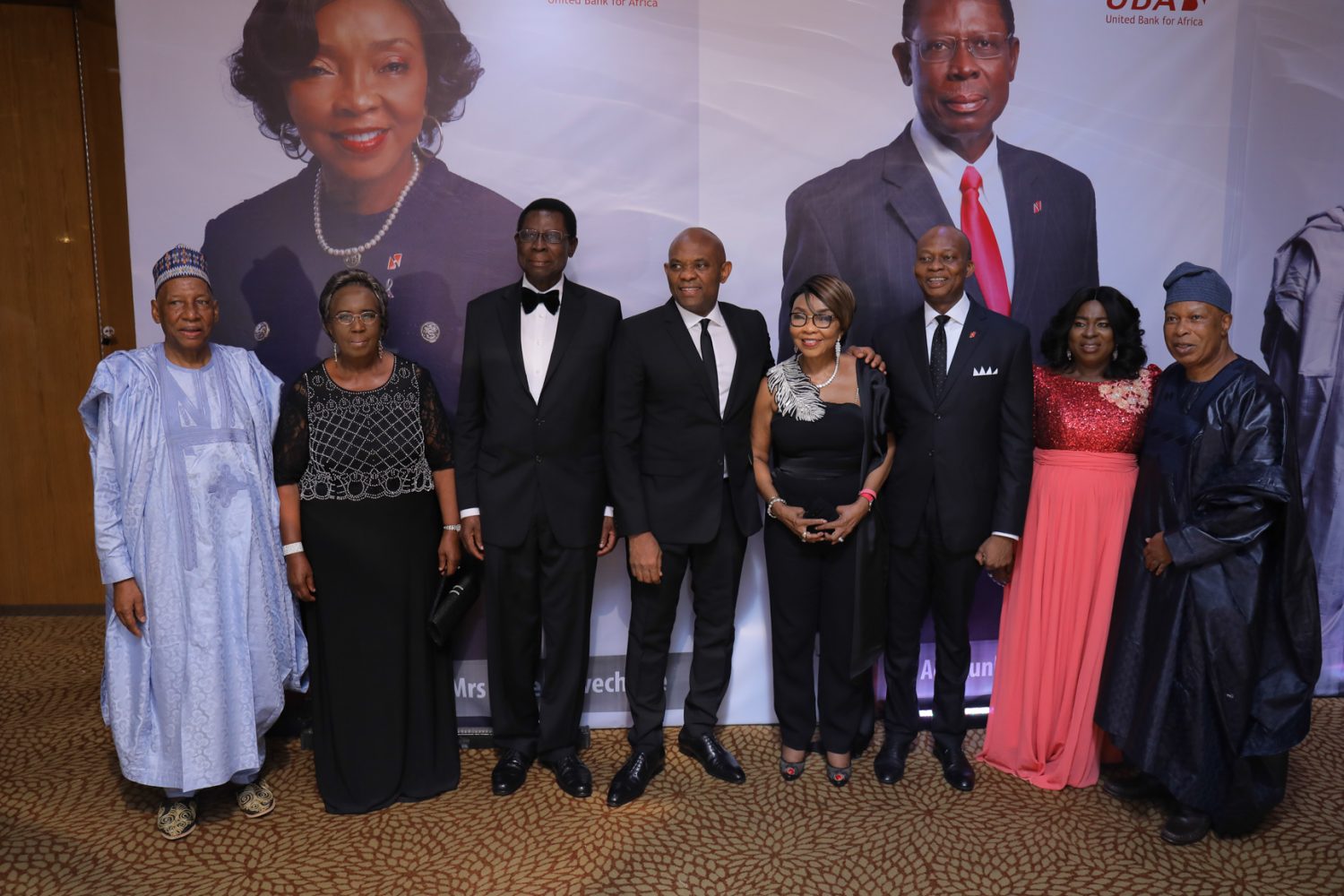 Appreciating Meritorious Services: L-R: Former Non-Executive Director, Alhaji Jafaru Paki; Emeritus Professor Mercy Olumide; Former Non-Executive Director, Ambassador Adekunle Olumide; Chairman, UBA Plc, Mr. Tony Elumelu; Former Non-Executive Director, Mrs. Rose Okwechime; GMD-CEO, Kennedy Uzoka; Former Non-Executive Director, Mr Zekeri Yahaya and wife Clara, during the send forth cocktail and dinner held by the Bank for the former Non-Executive Directors, held at Transcorp Hilton, Abuja on Friday