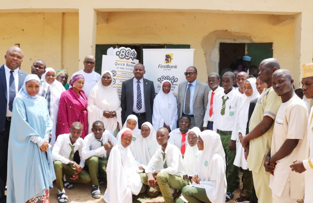 Group Photograph with Group Head, North East, Mr. Ahmed Abubakar Badawi, Business Development Manager, Yola/Jalingo, Mr. Mustapha Mohammed Munir, Business Manager Jalingo Main Branch, Ayuba Mamman-Maina, Staff of Muhd Nya Secondary School and some students after the program