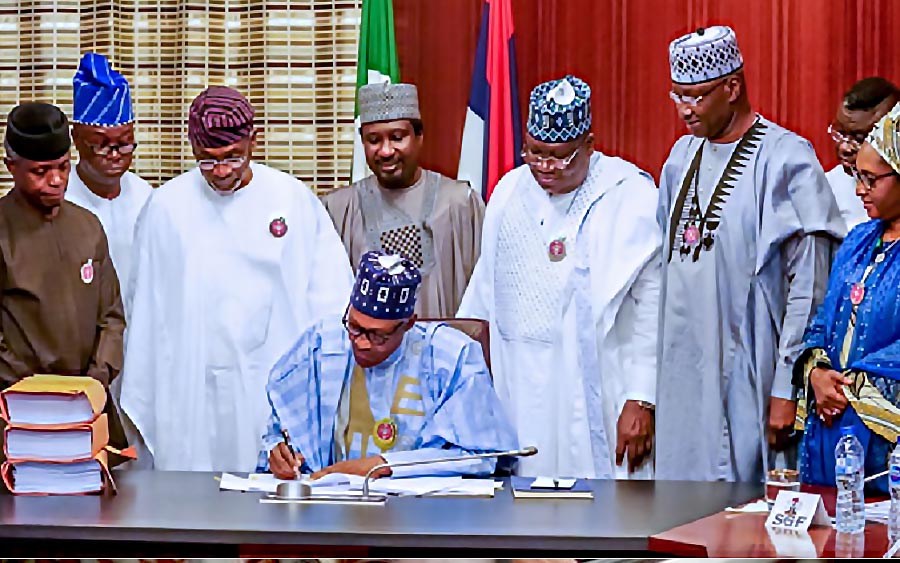 Budget: FG completes just 31.7% of constituency projects, Nigerians react to President Buhari's signing of Finance Bill 