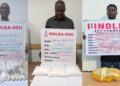 NDLEA officers display seized items and suspects with evidence boards