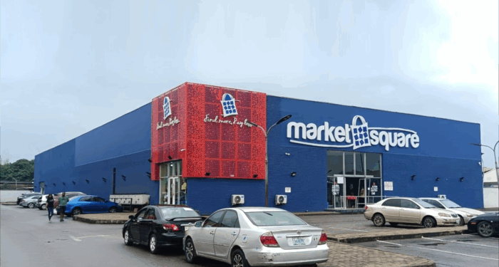 Supermark building with cars parked outside