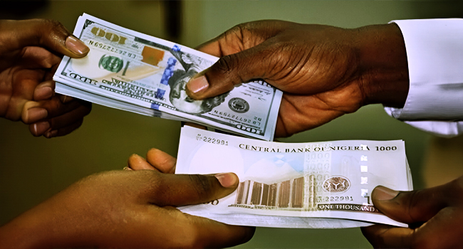 Naira slides to N1,359/$ after CBN cuts interest rate to 26.5%