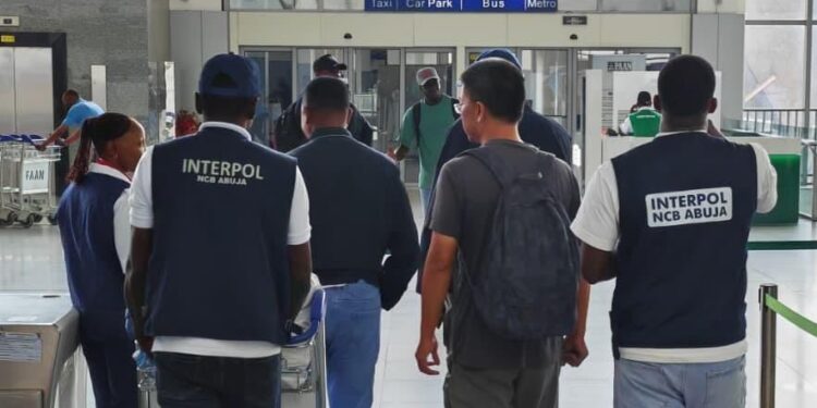 Police repatriate Chinese suspect over $245 million Ponzi scheme fraud